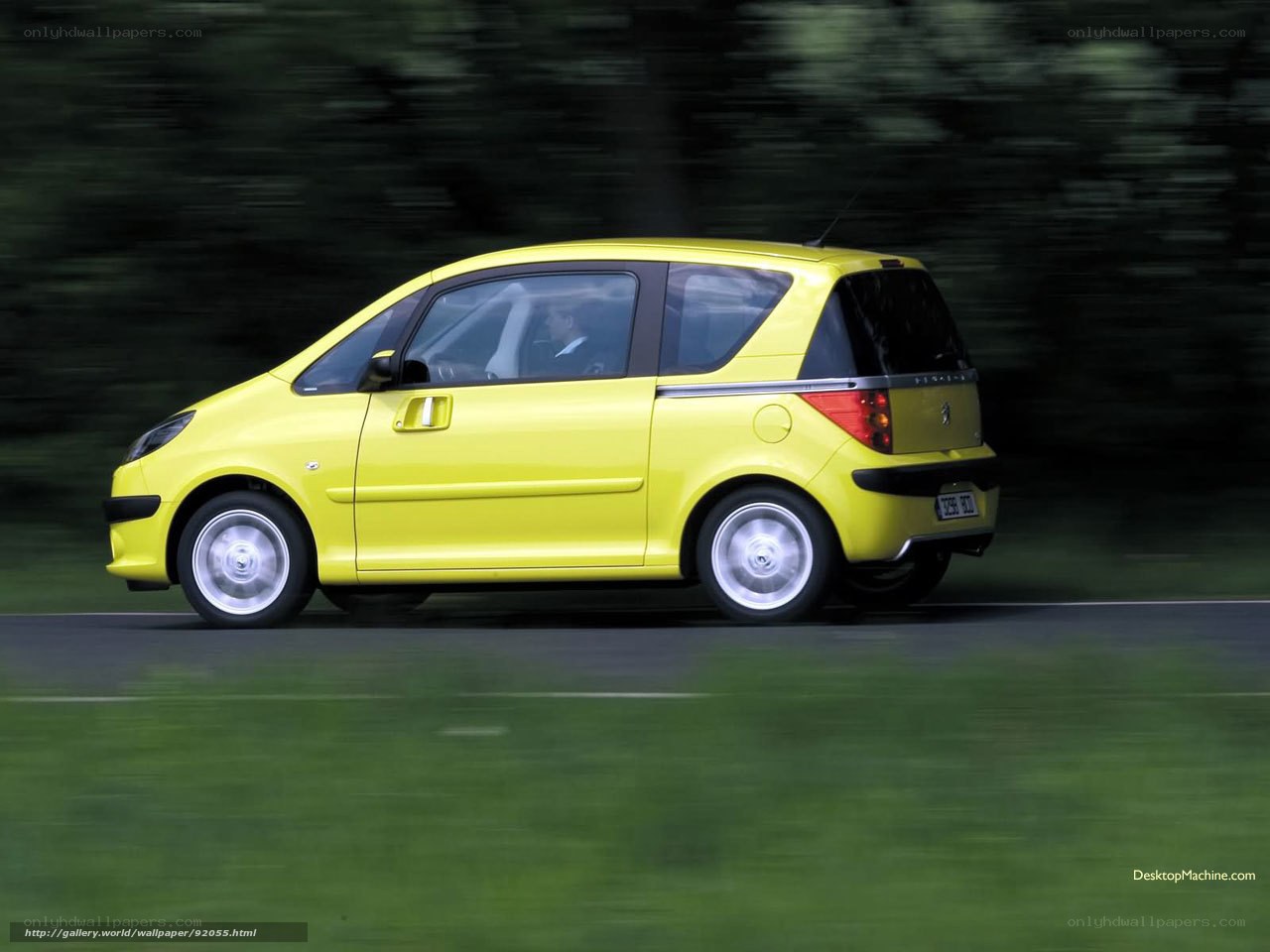 yellow car in motion