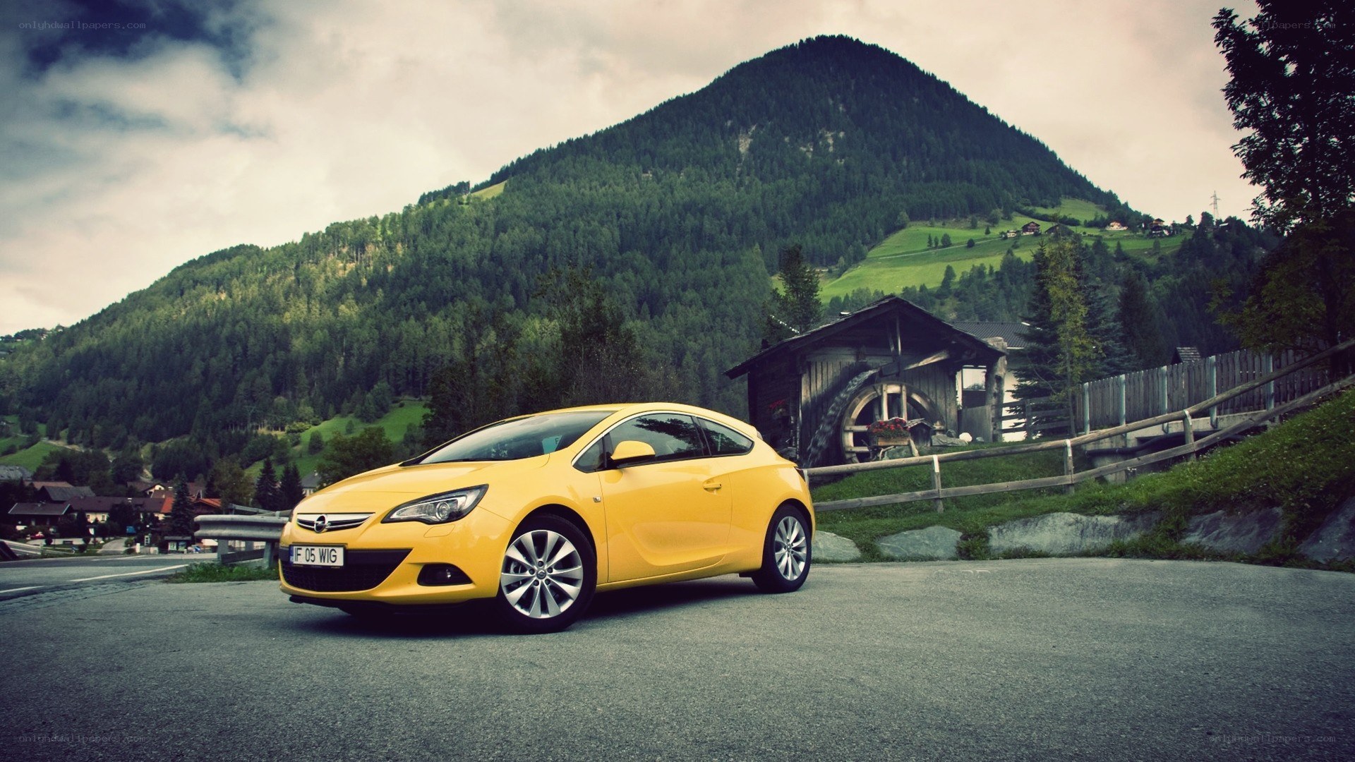 Yellow car in mountain village