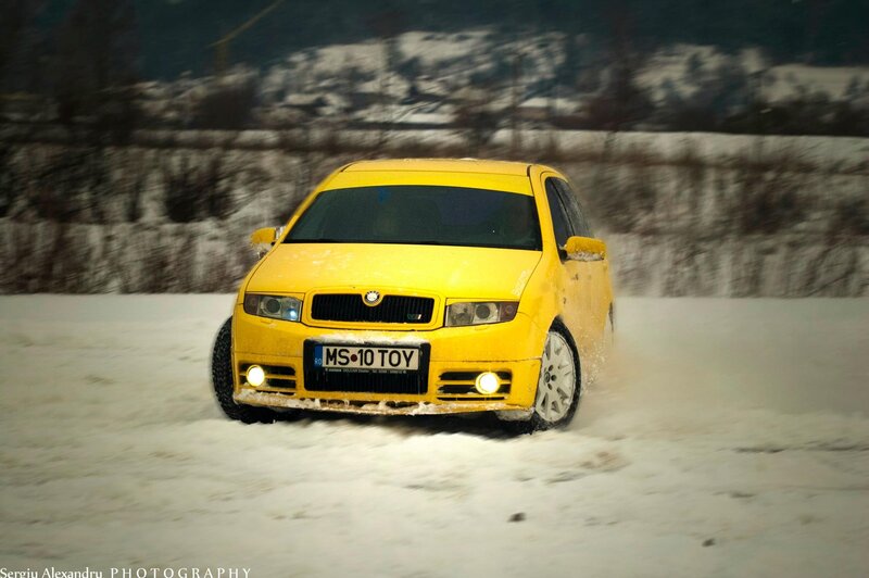 Yellow Car in Snow