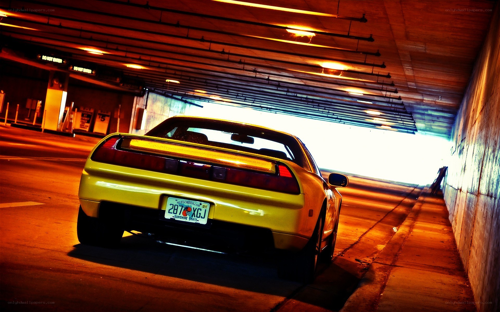 Yellow car in underground tunnel