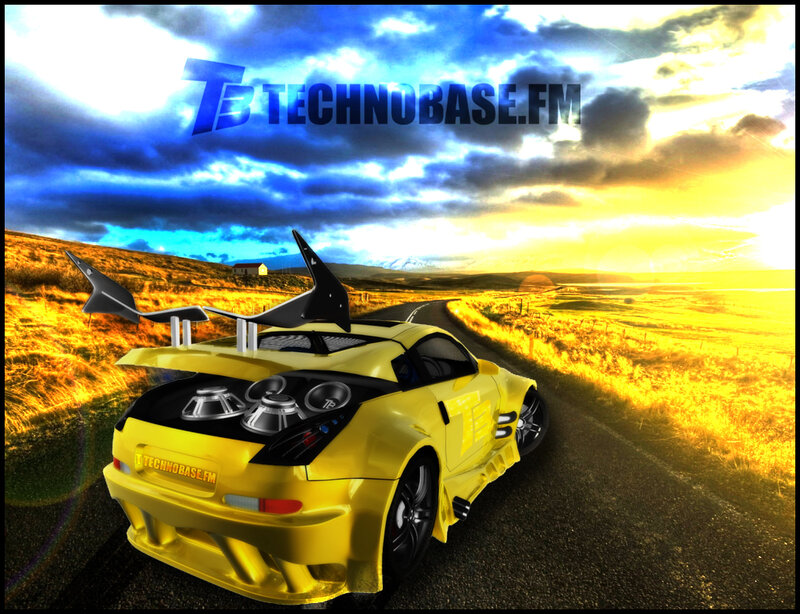 Yellow car on a road at sunset