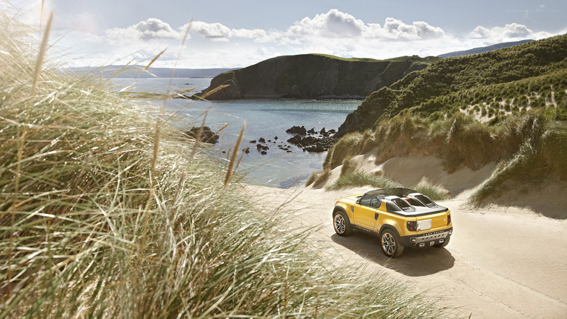 Yellow car on coastal path