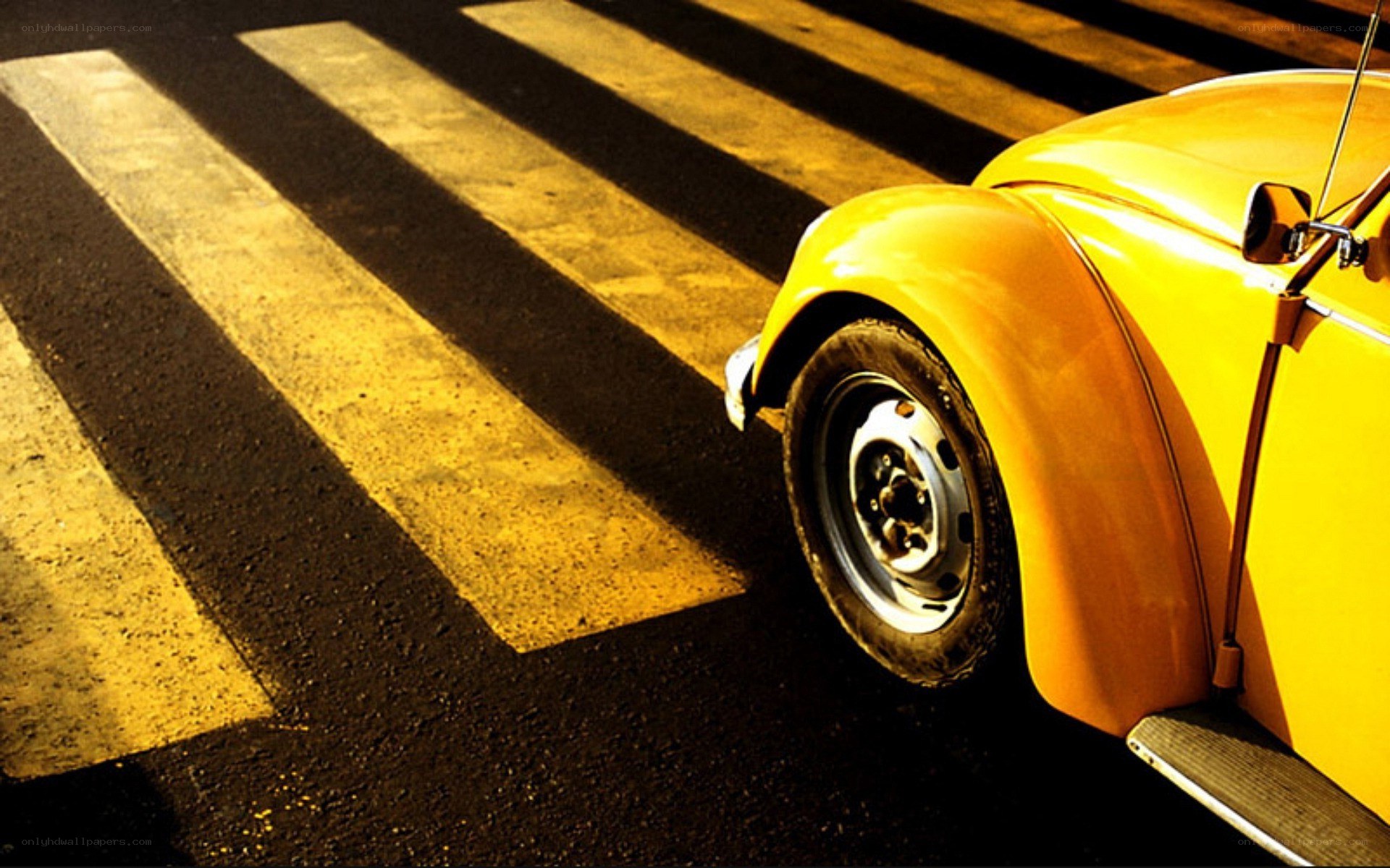 Yellow car on crosswalk