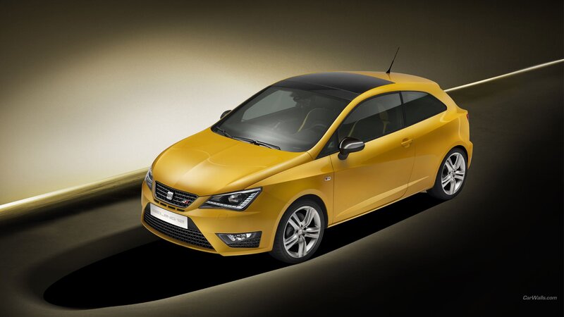 Yellow Car on Dark Road