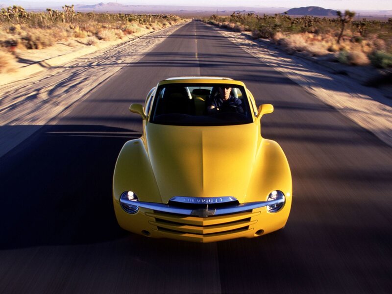 Yellow car on desert road