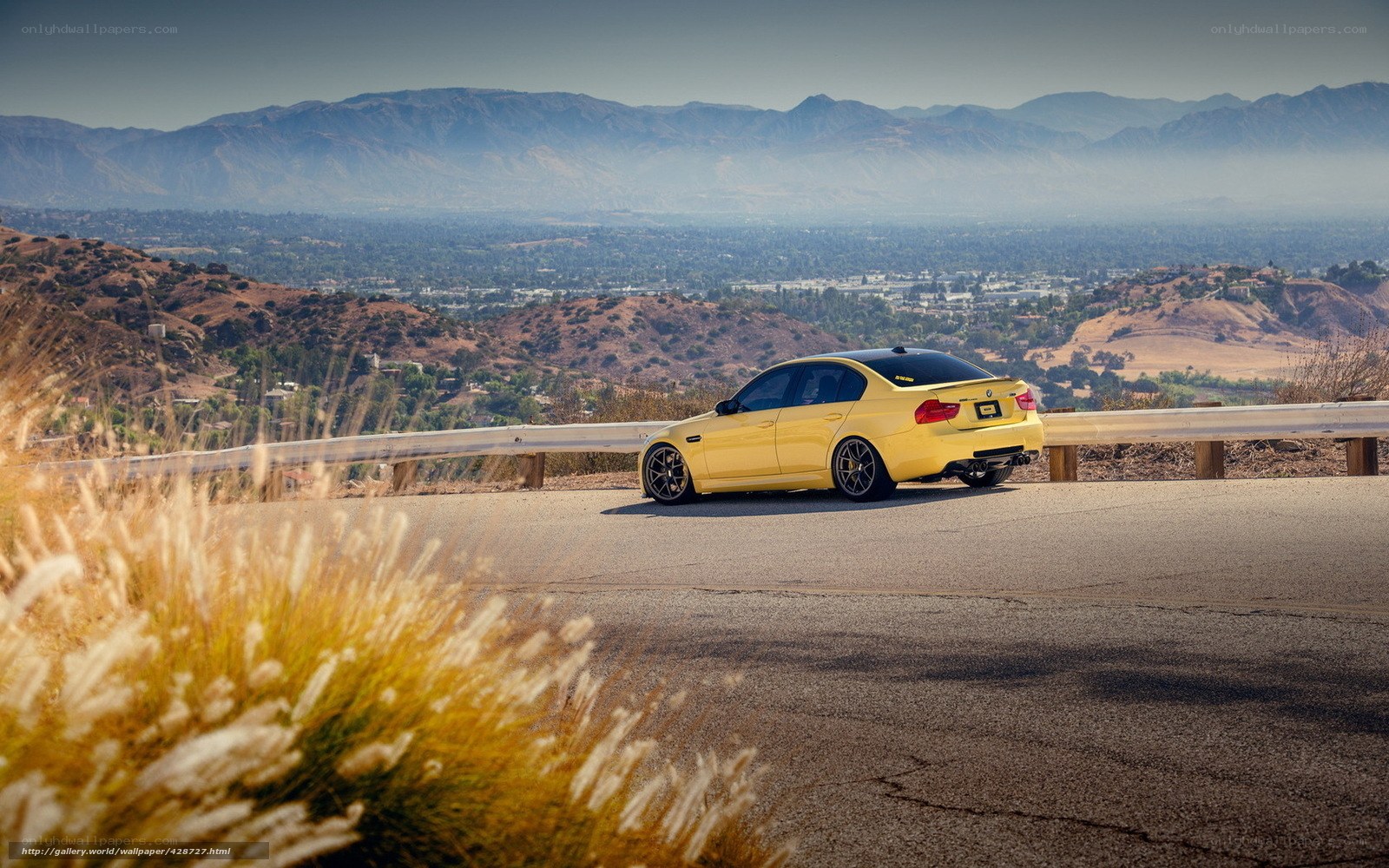 Yellow car on mountain road