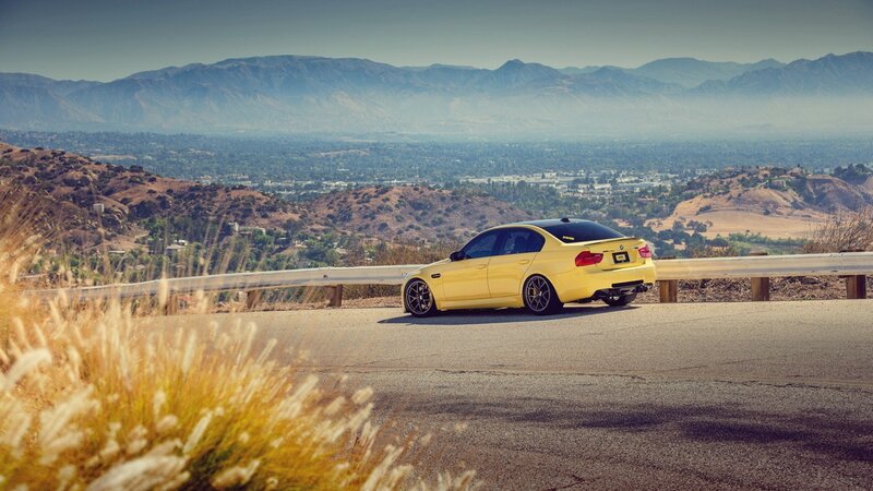 Yellow car on mountain road