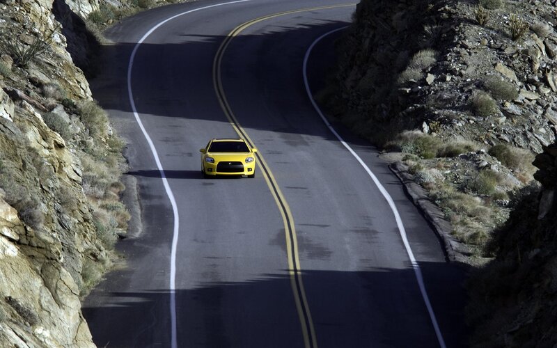 Yellow Car on Road — Dramatic, Afternoon, Photograph, Mountain