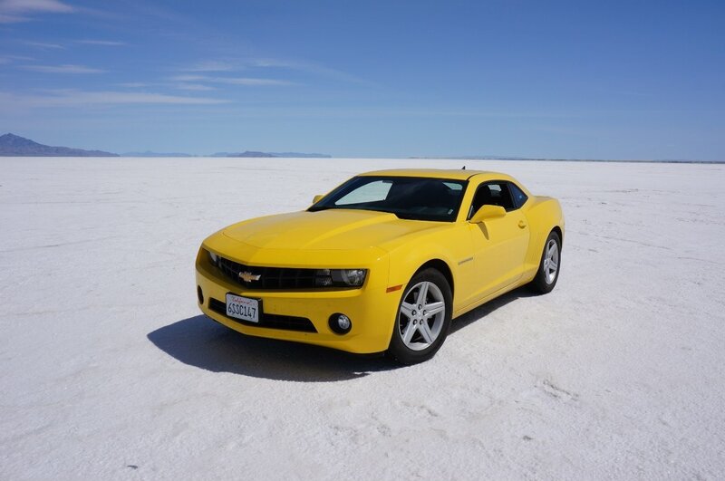 Yellow car on salt flat