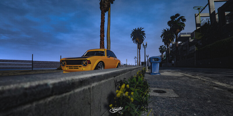 Yellow Car on Sidewalk