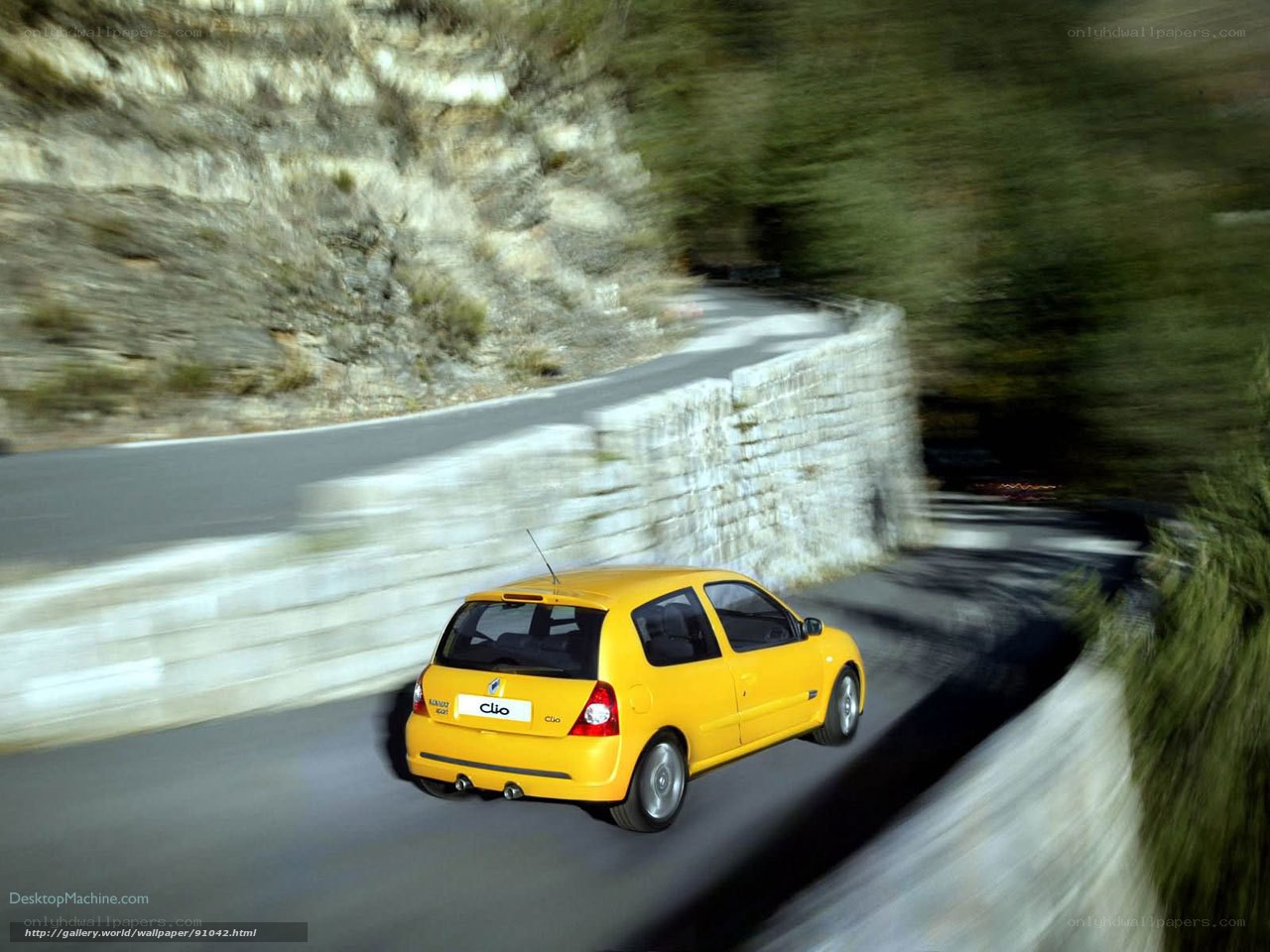 Yellow car on winding road