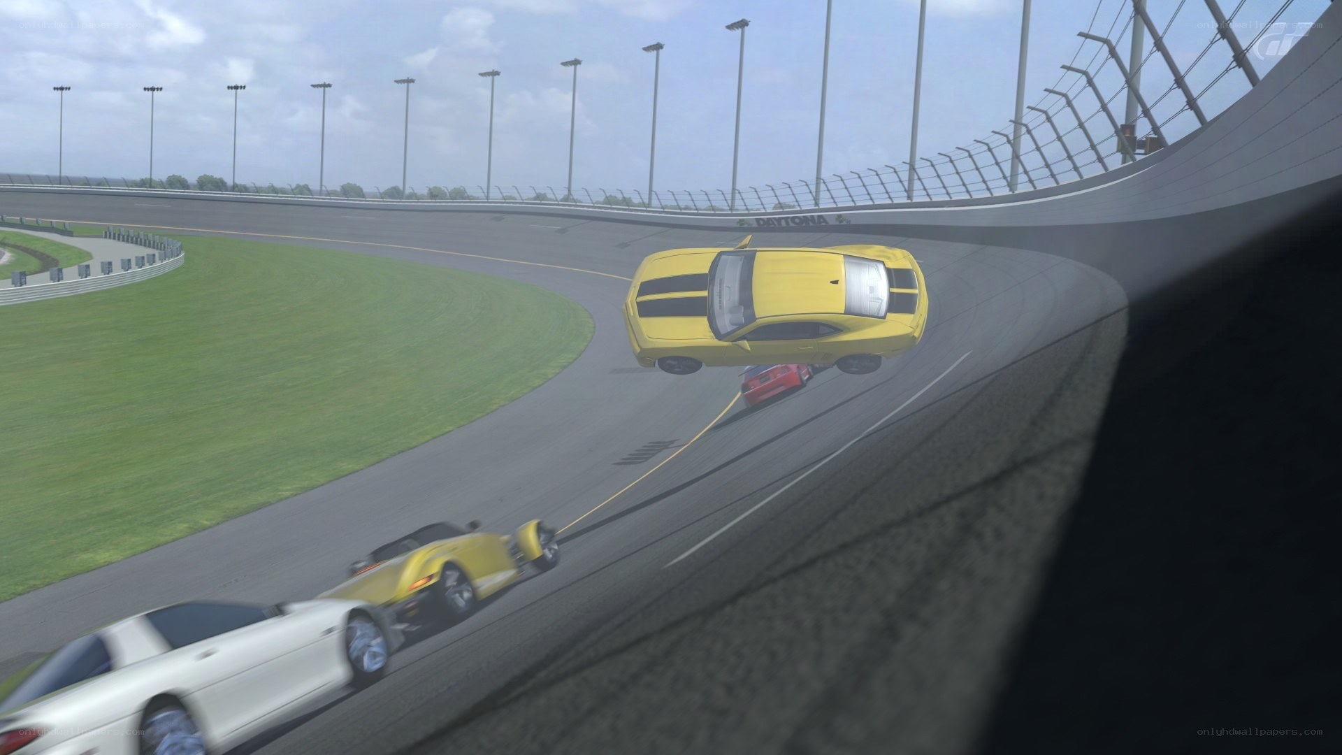 Yellow car racing on track