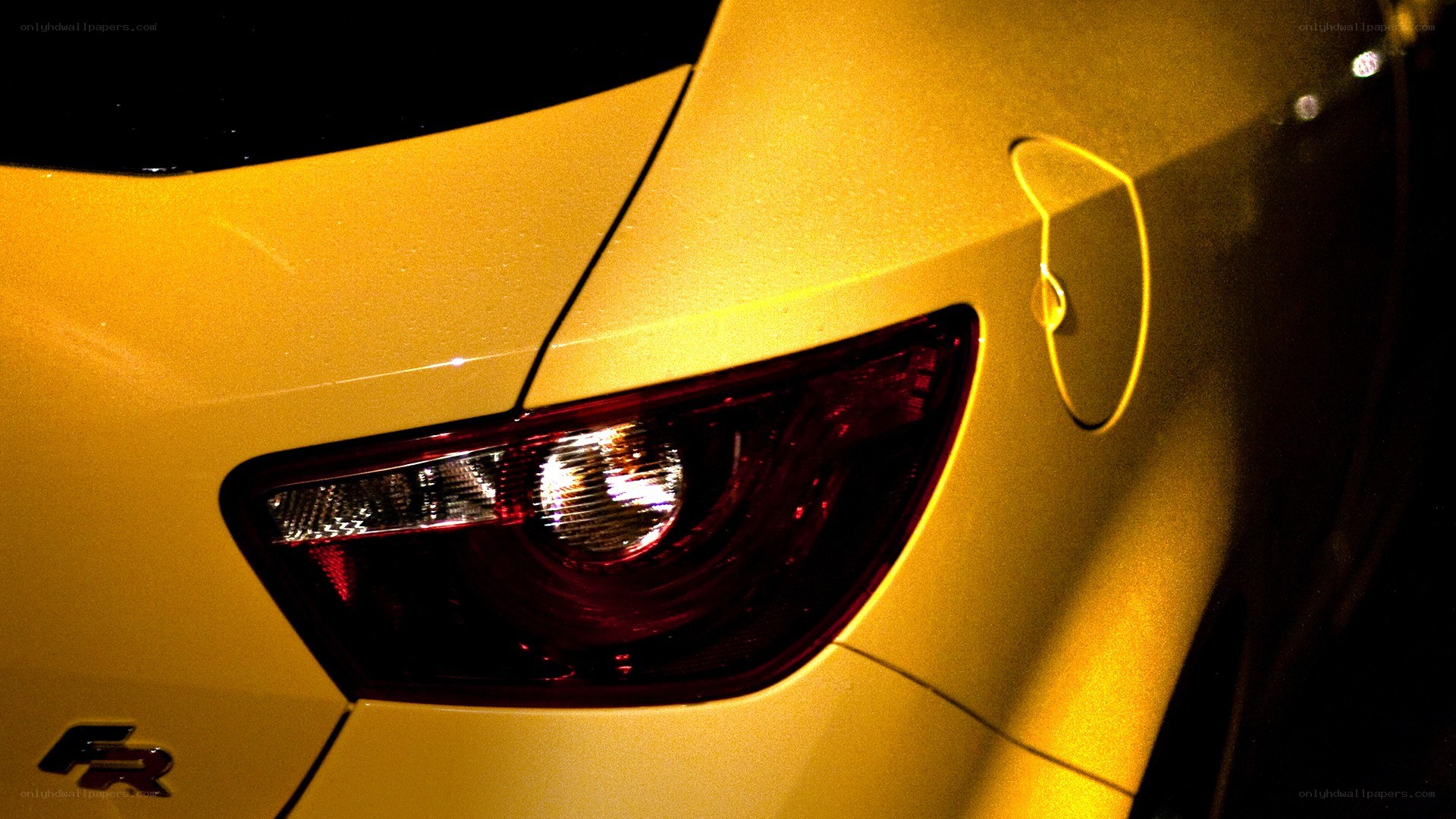 yellow car taillight at night