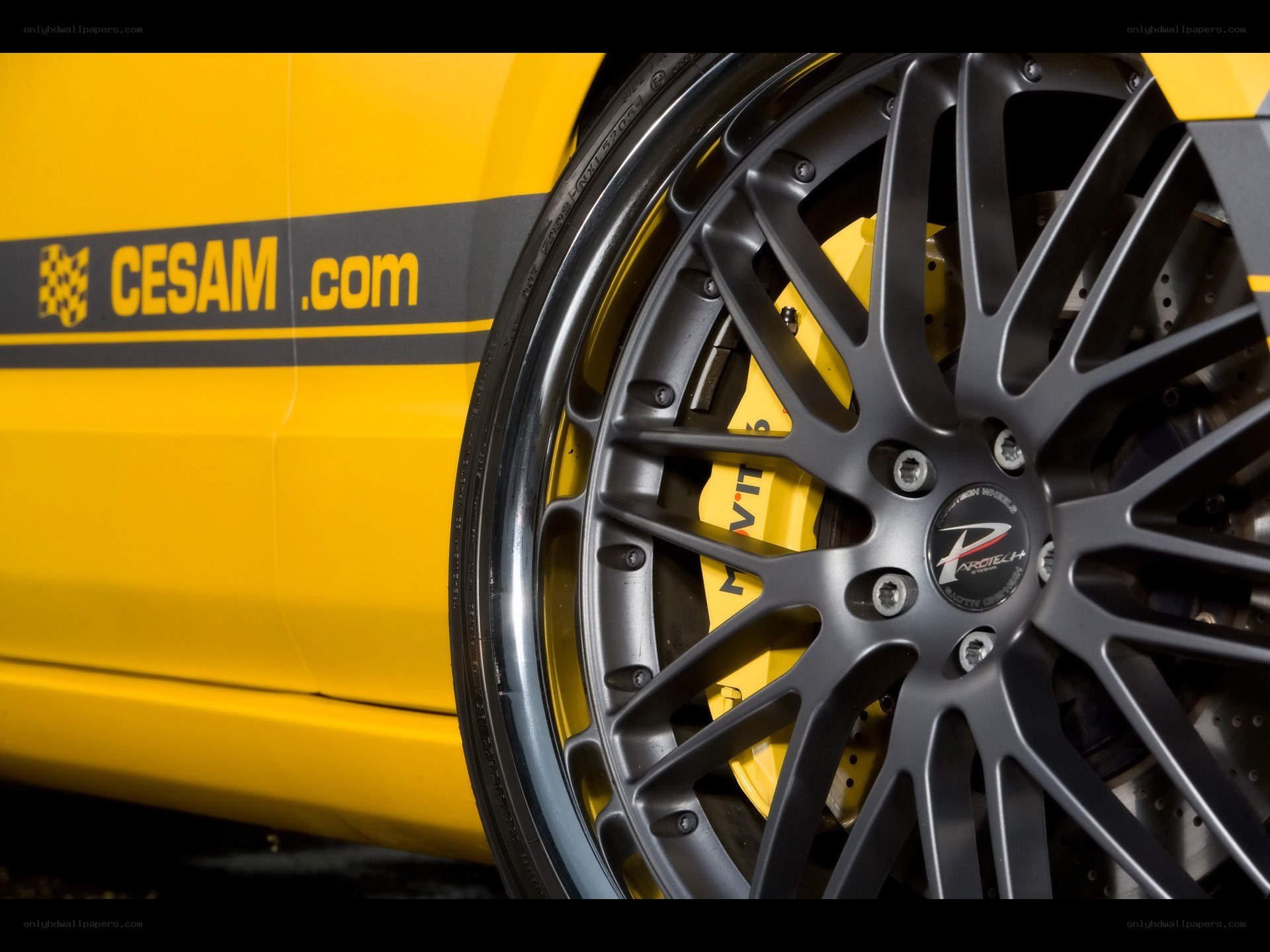 Yellow car wheel close-up