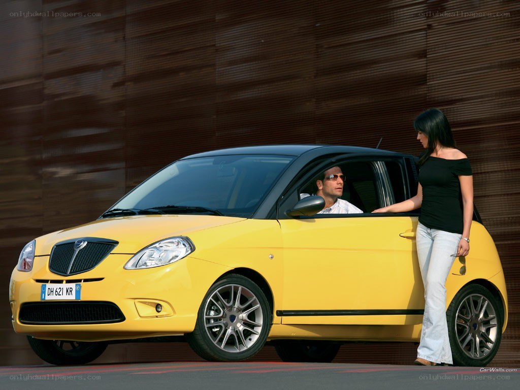 Yellow car with couple