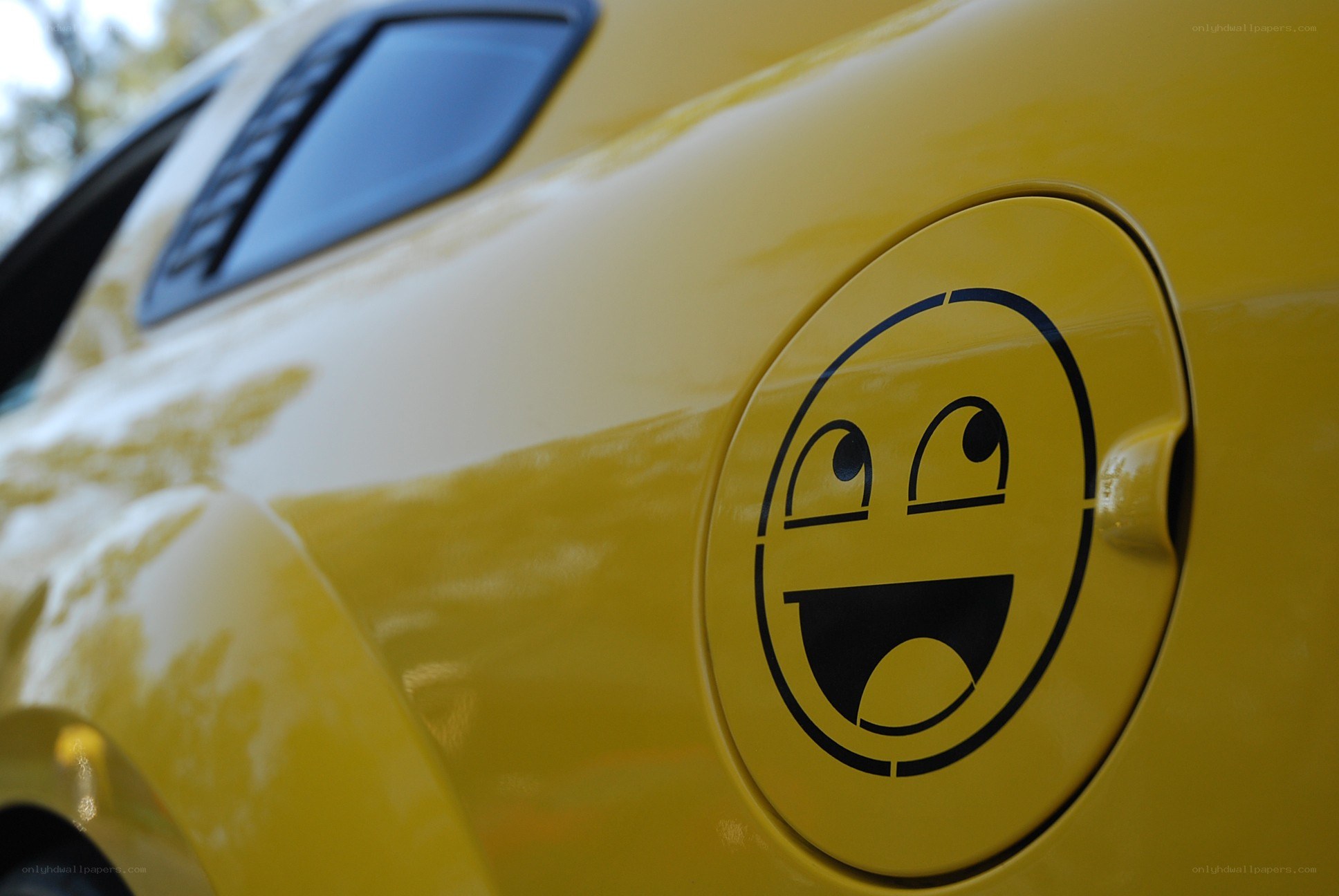 yellow car with smiley face