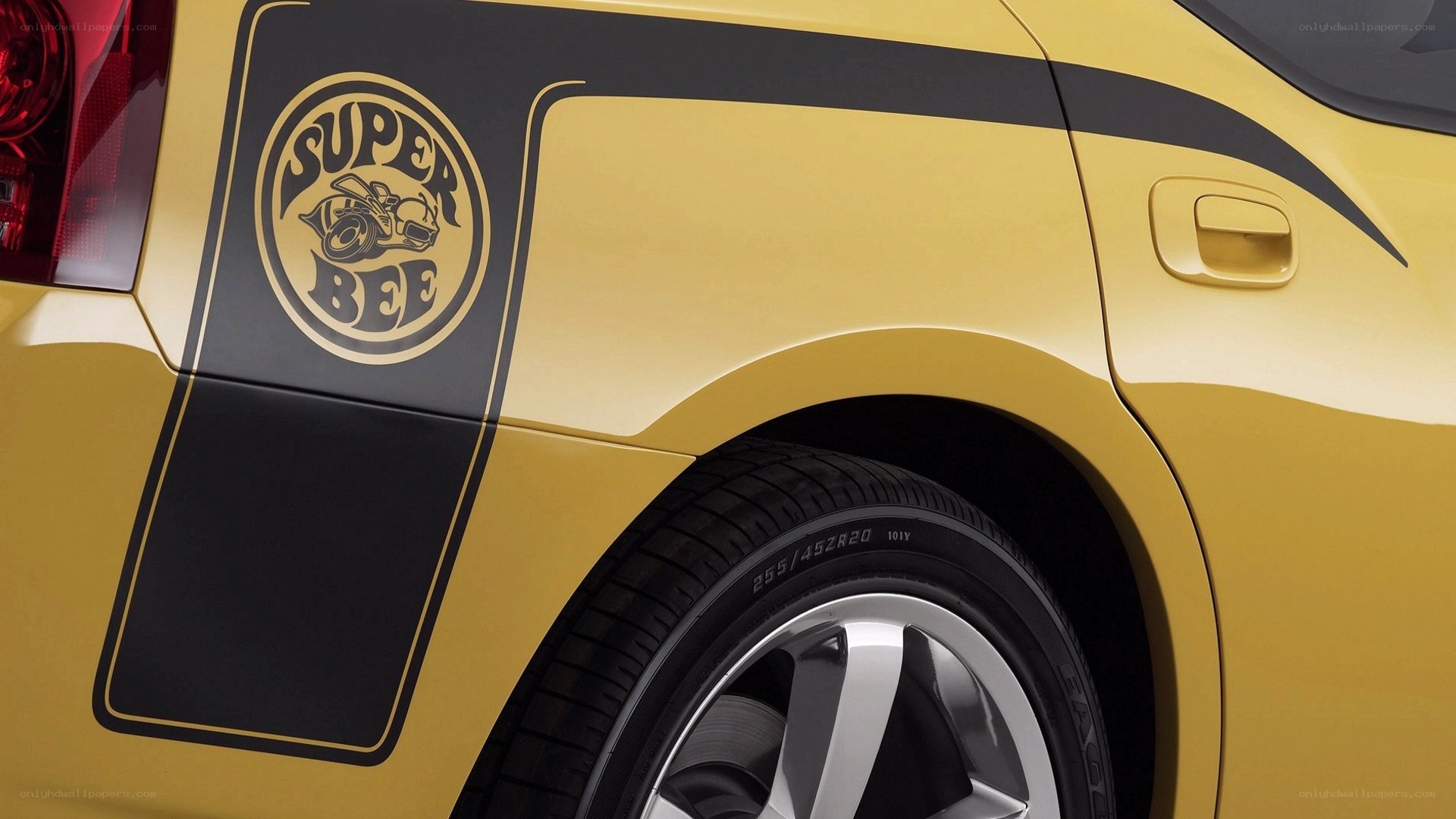 yellow car with super bee decal