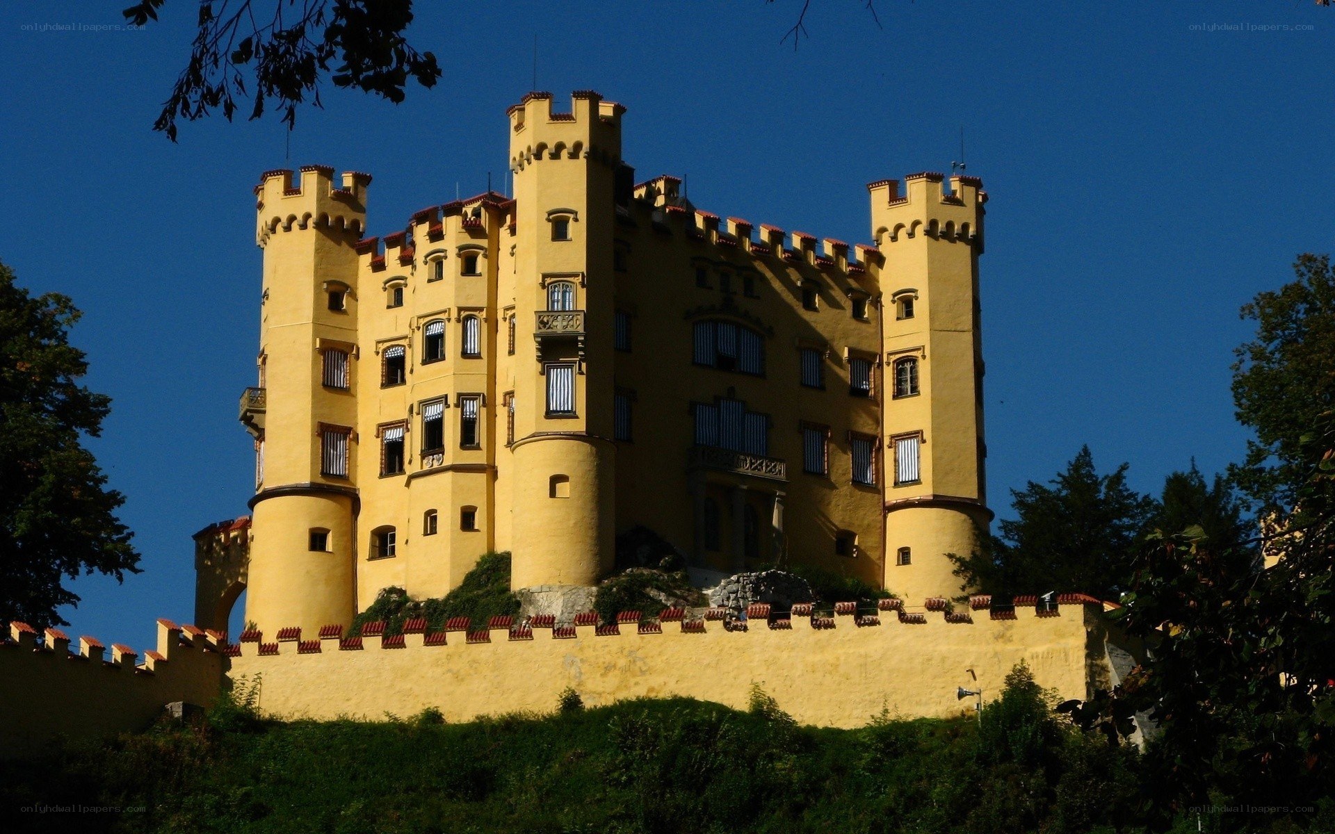 yellow castle on a hill