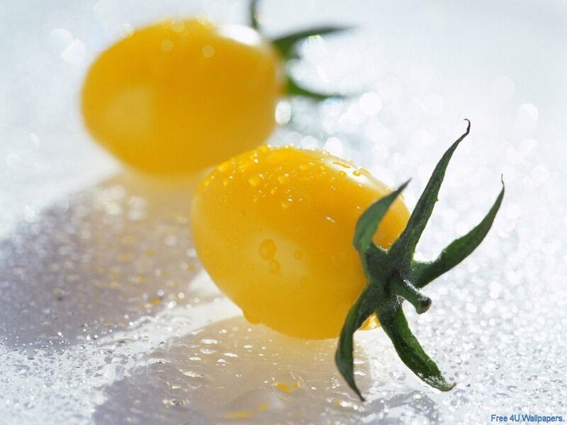 yellow cherry tomatoes on ice