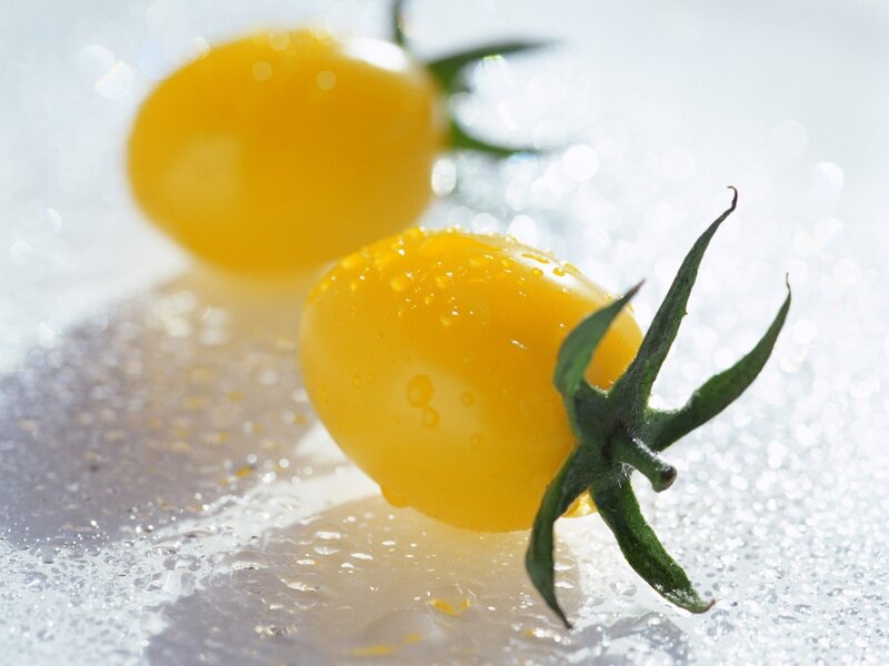 yellow cherry tomatoes on ice