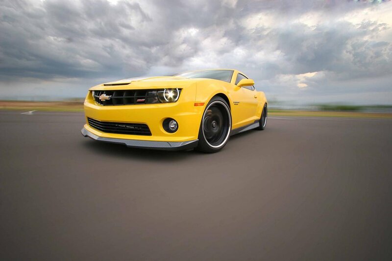 yellow chevrolet camaro on track