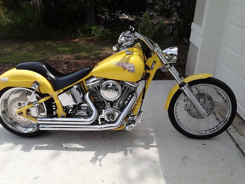 Yellow Chopper Motorcycle — Calm, Afternoon, Photograph, Garage Door