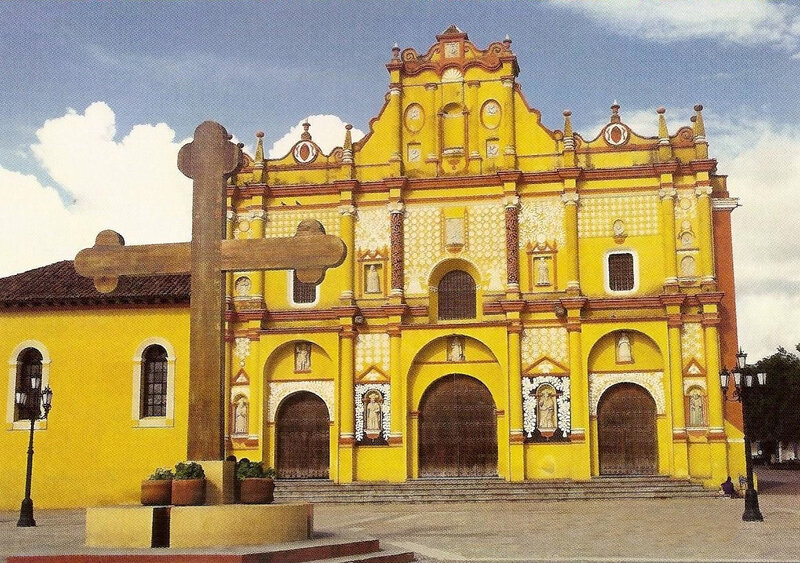 Yellow church with cross