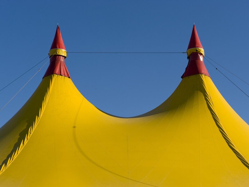 Yellow circus tent peaks