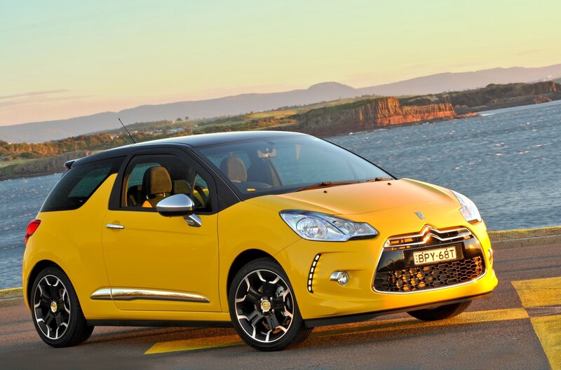 Yellow Citroën DS3 by the coast