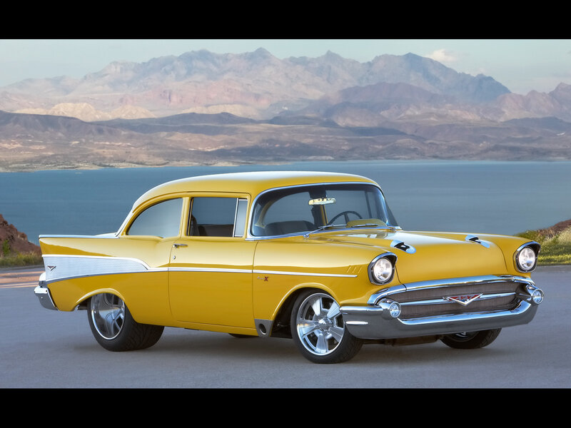 Yellow classic car by the lake