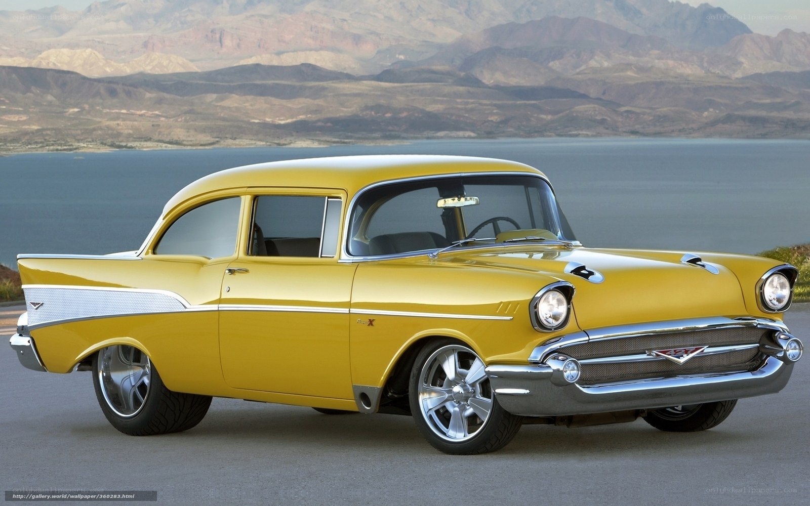 Yellow classic car by the lake