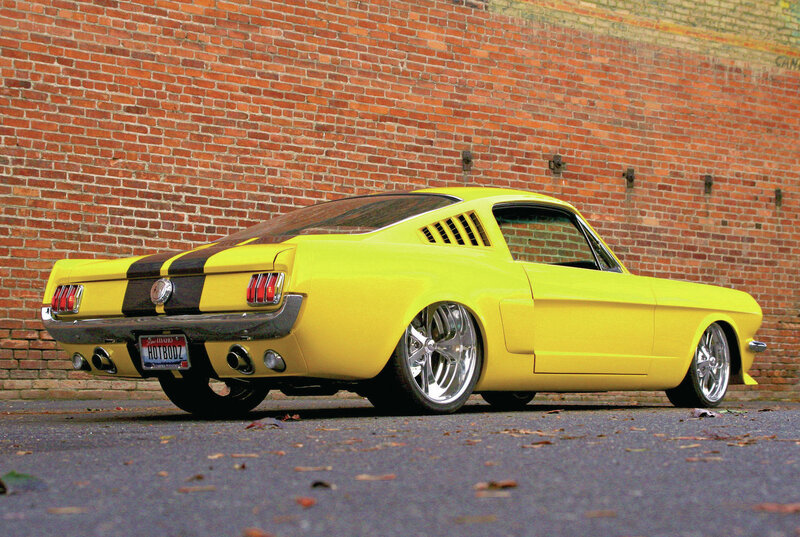 Yellow Classic Car — Dramatic, Photograph, Brick Wall