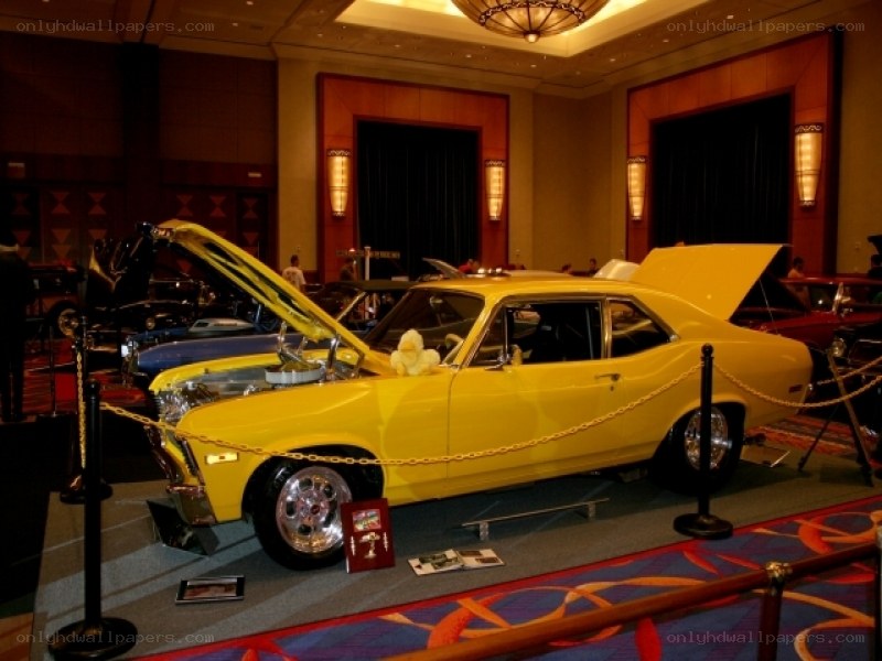 Yellow classic car on display