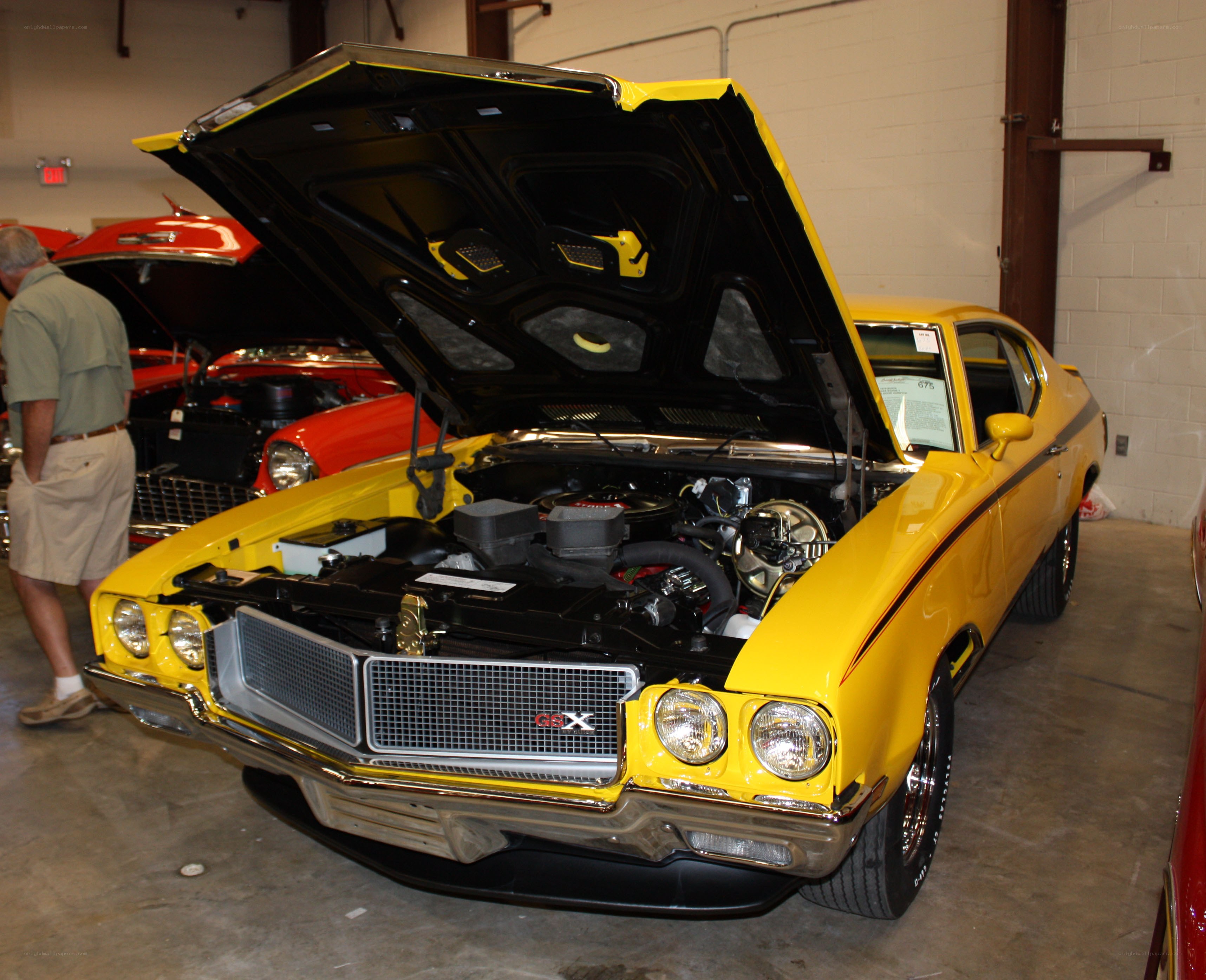 Yellow classic car on display