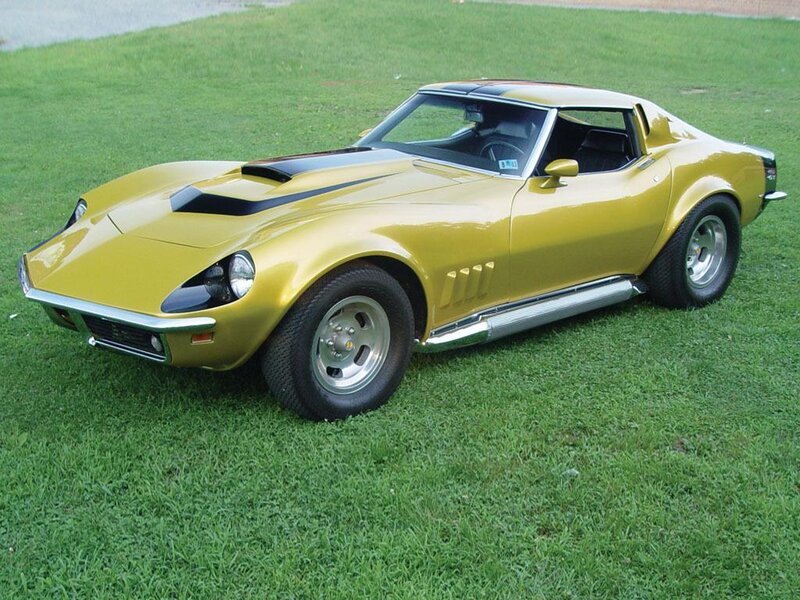 yellow classic corvette sports car
