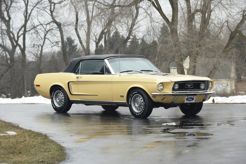 Yellow classic Ford Mustang convertible