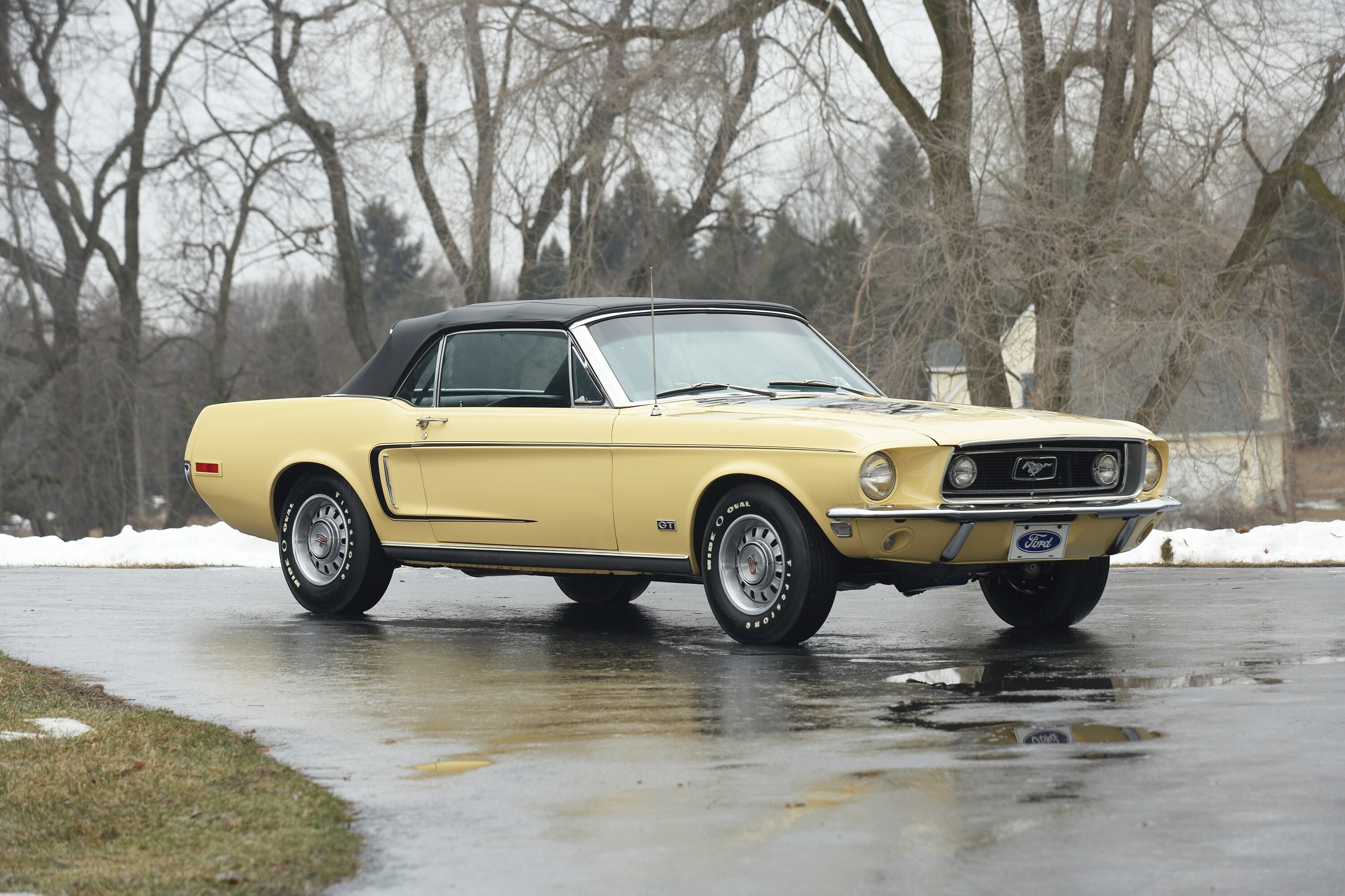 Yellow classic Ford Mustang convertible