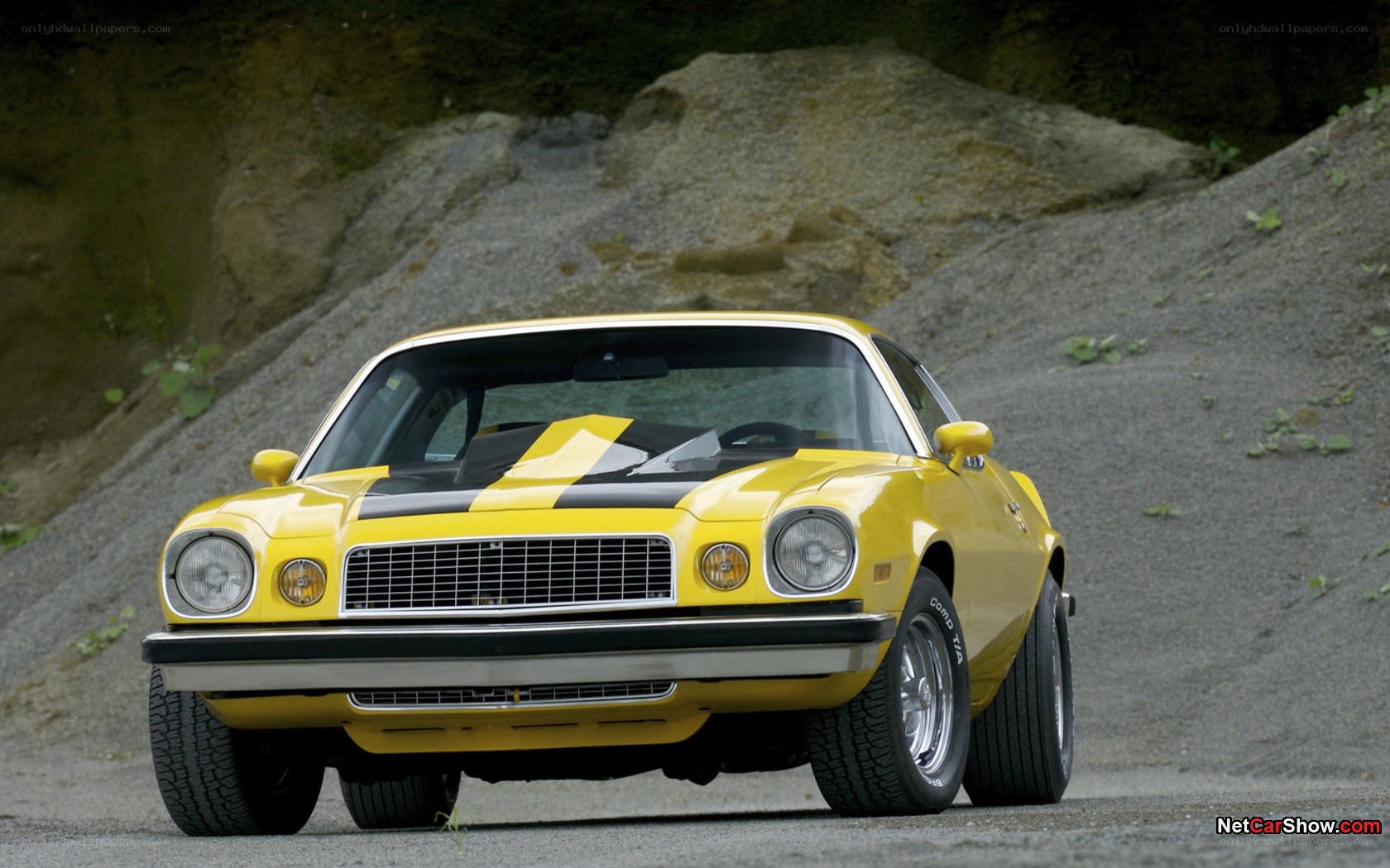 yellow classic muscle car