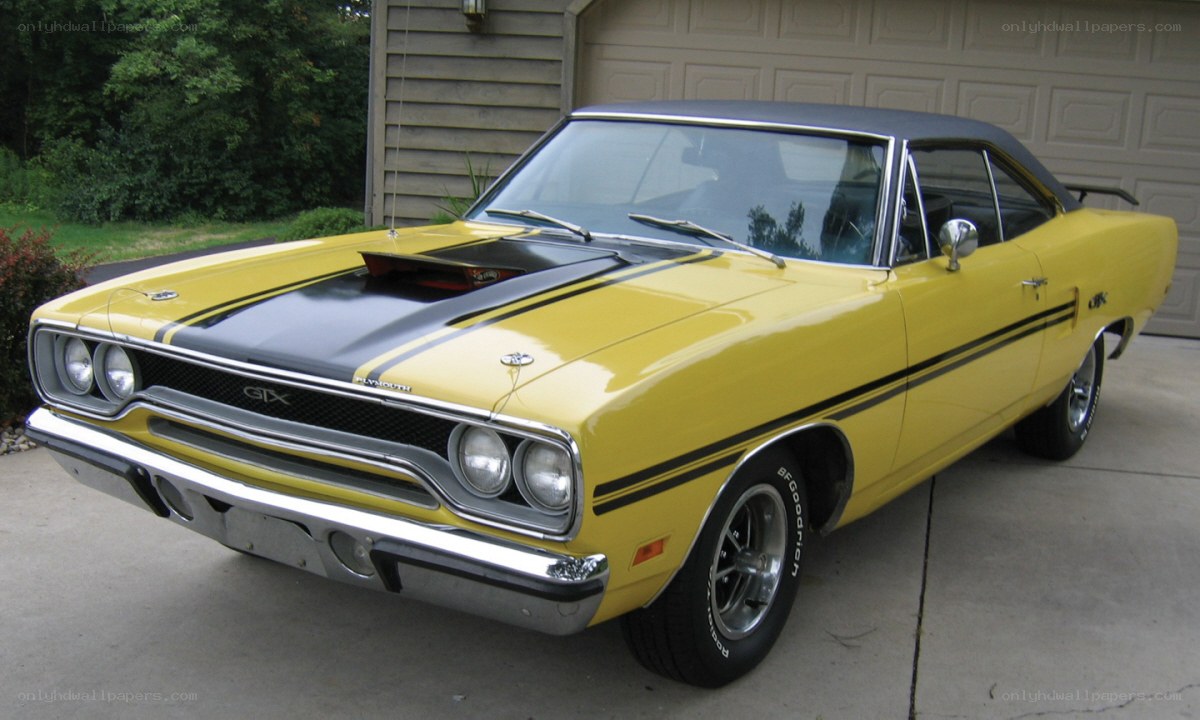 yellow classic muscle car