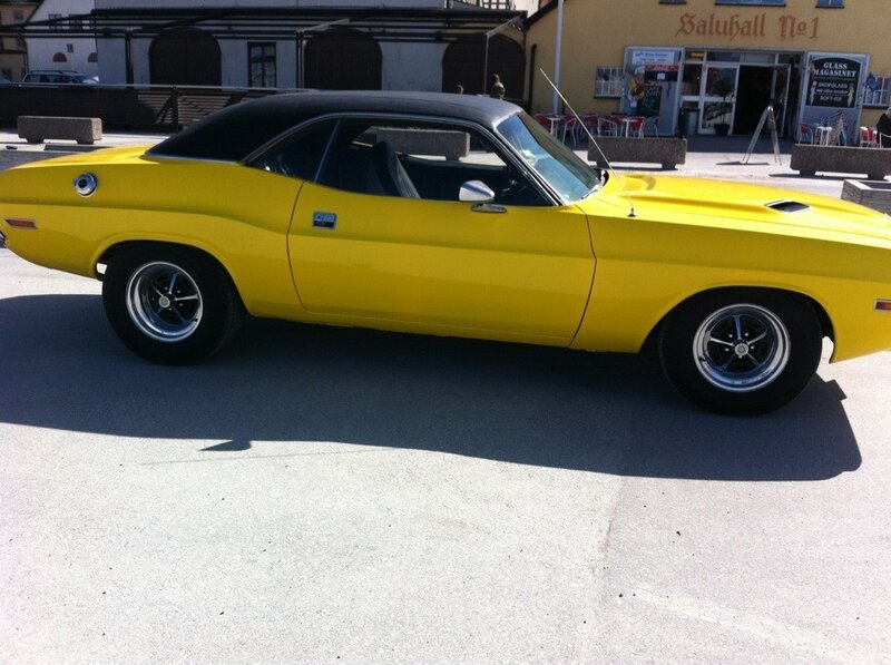 yellow classic muscle car