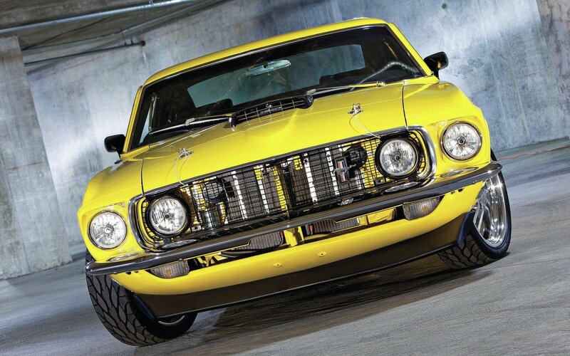 yellow classic muscle car