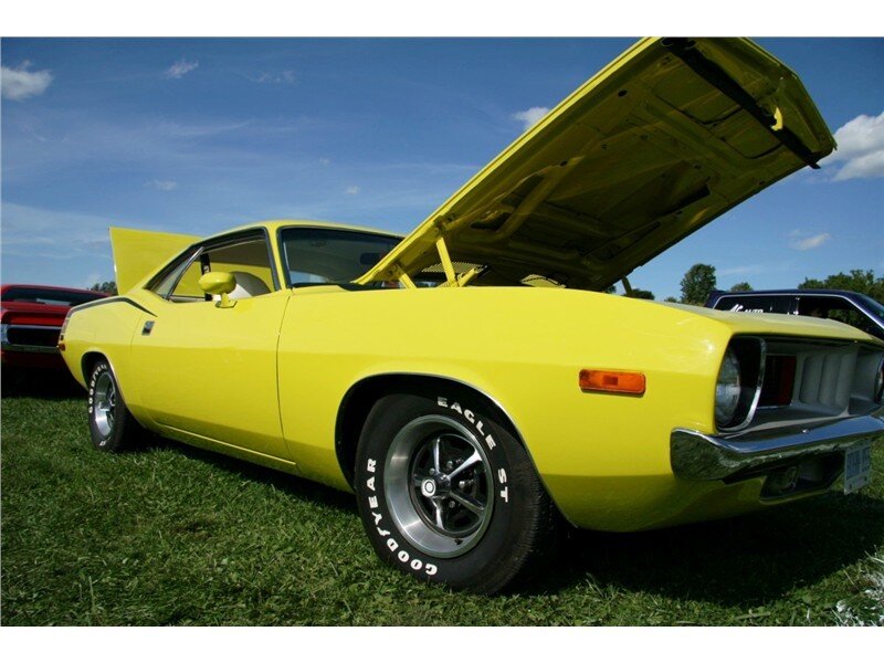 yellow classic muscle car