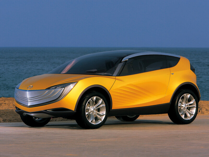 Yellow concept car by the sea
