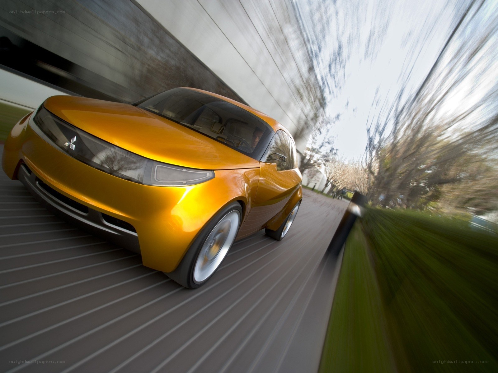 Yellow concept car in motion