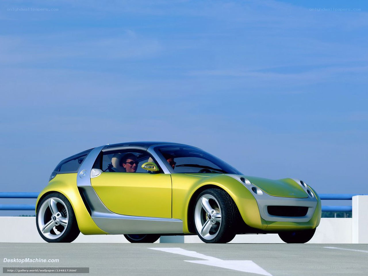 Yellow concept car on a bridge