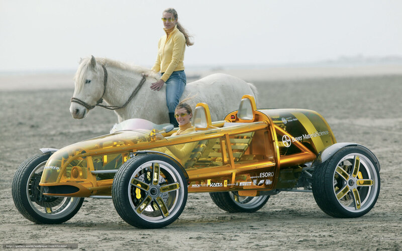 Yellow concept car on beach