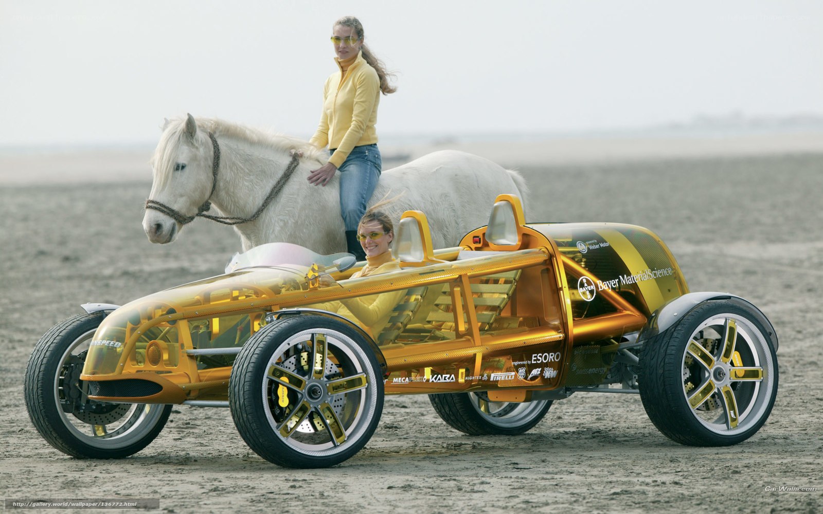 Yellow concept car on beach