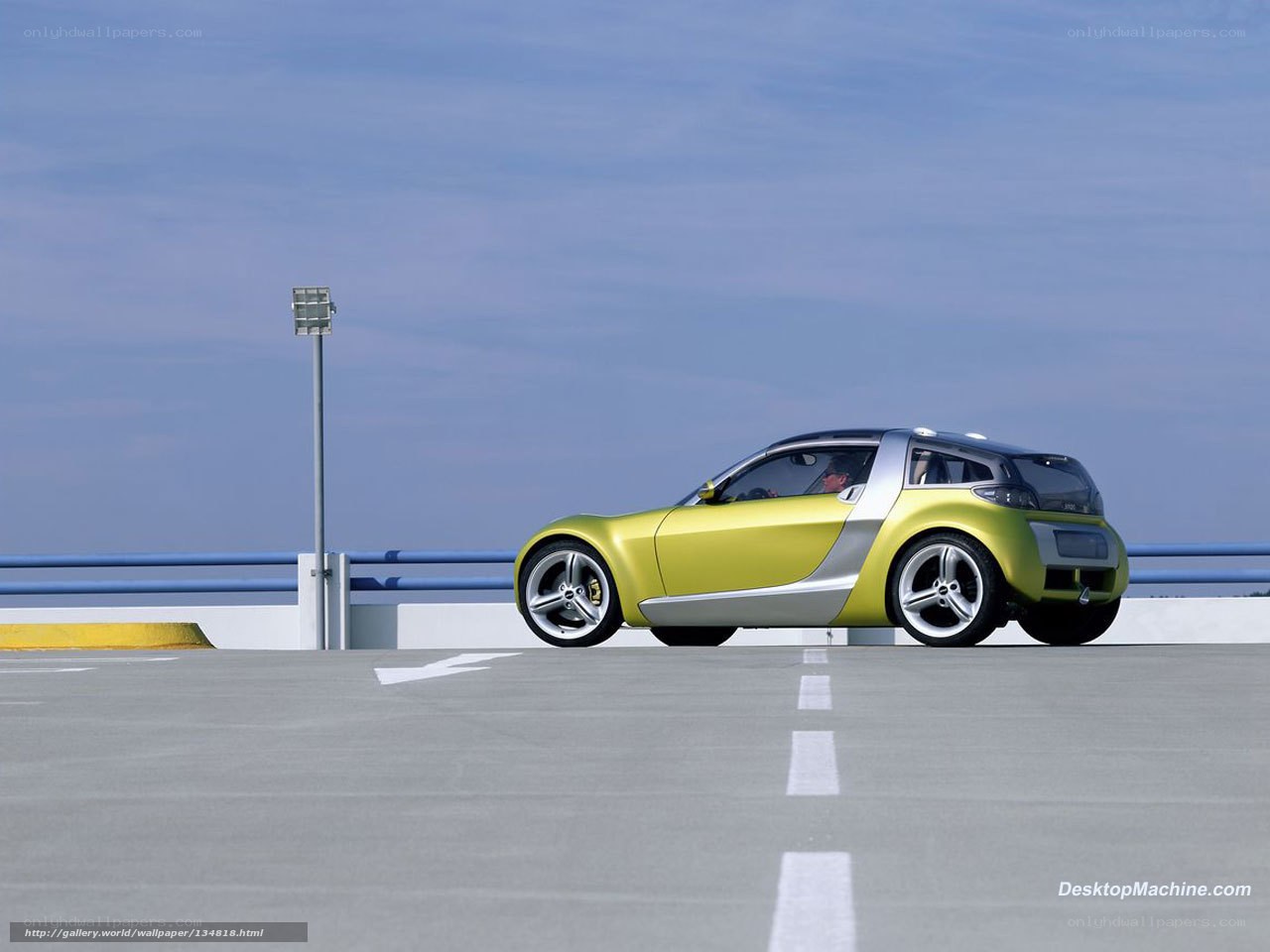 yellow concept car on bridge