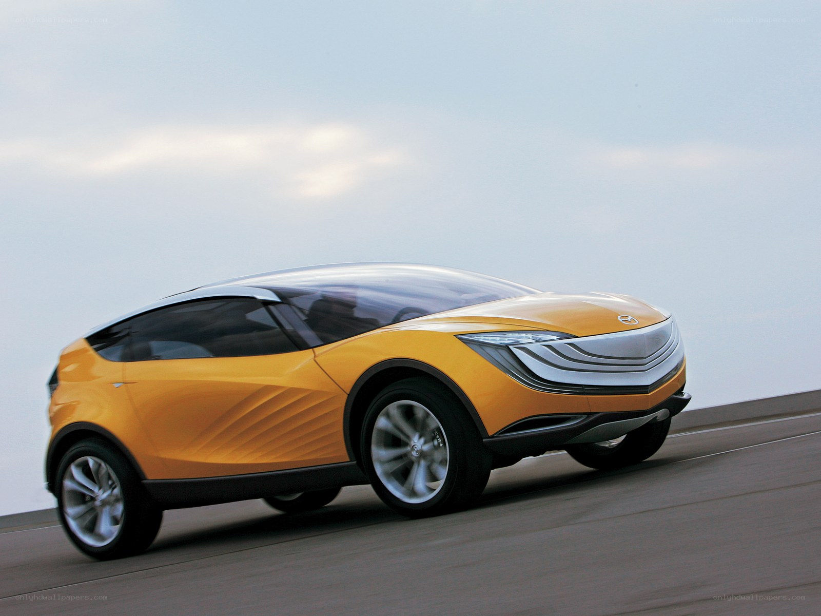 yellow concept car on road