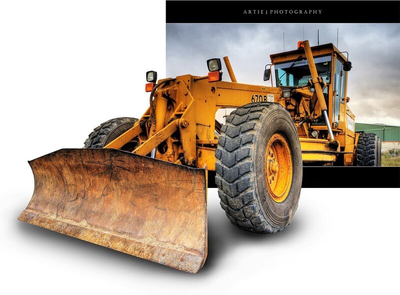 Yellow construction grader